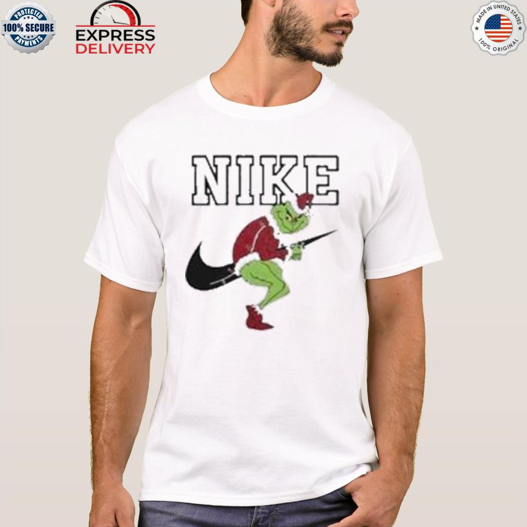 Green nike logo and grinch Christmas sweater